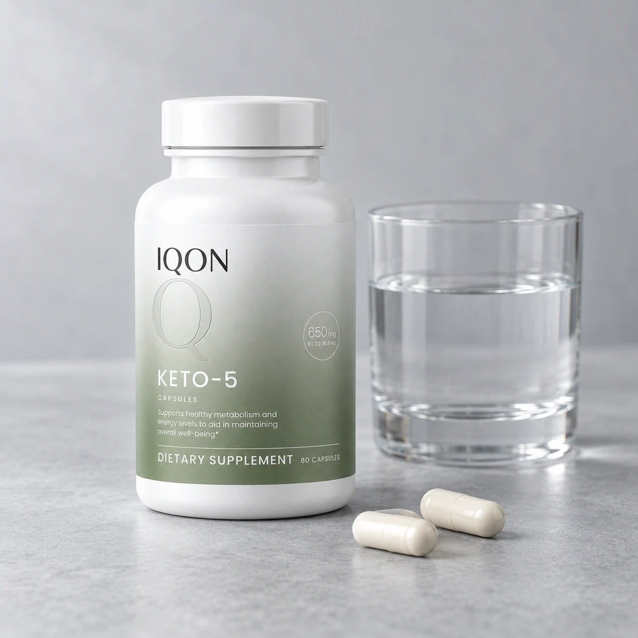 IQON Keto-5 with two capsules and a glass of water
