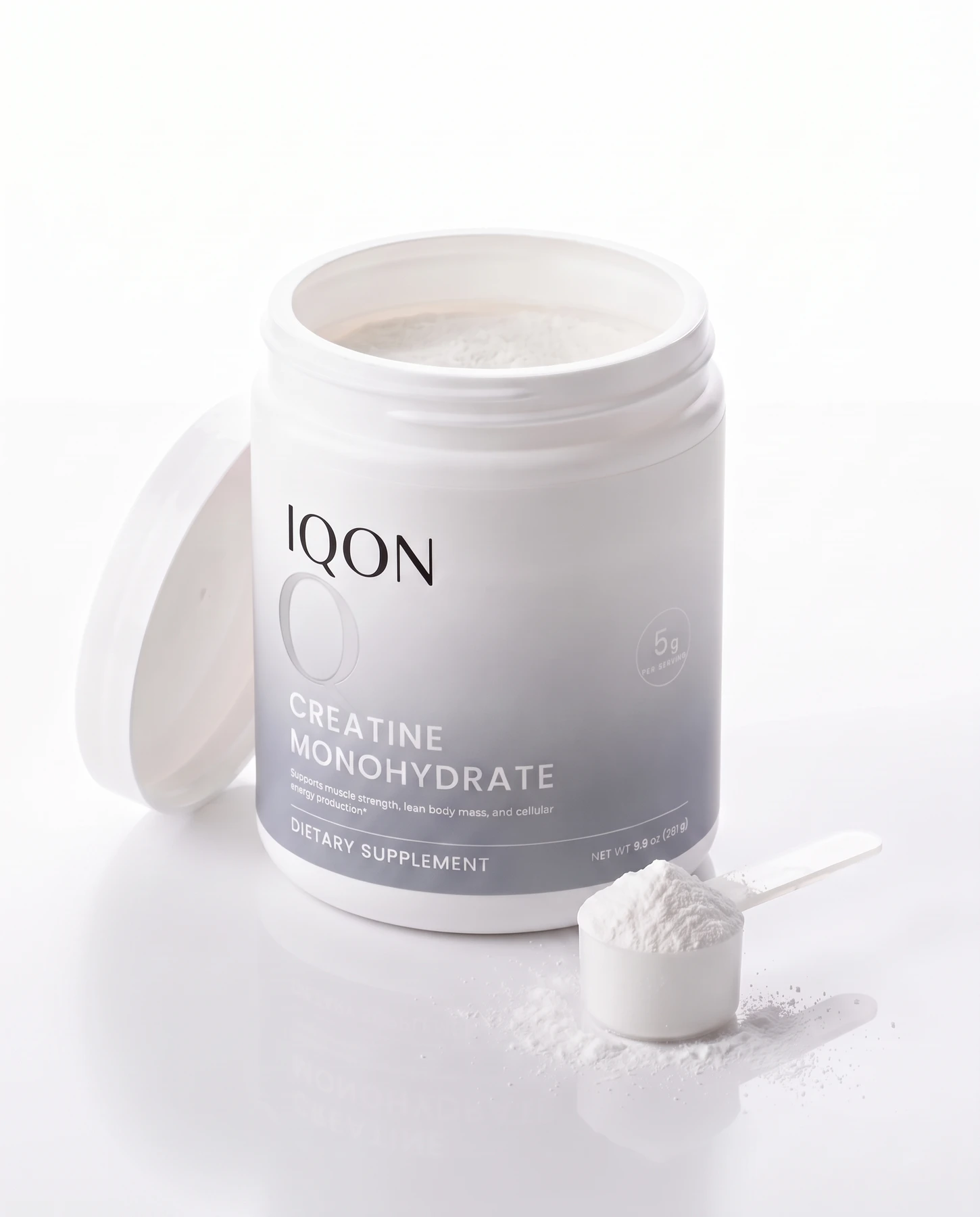 IQON Creatine Monohydrate jar, open with its scoop